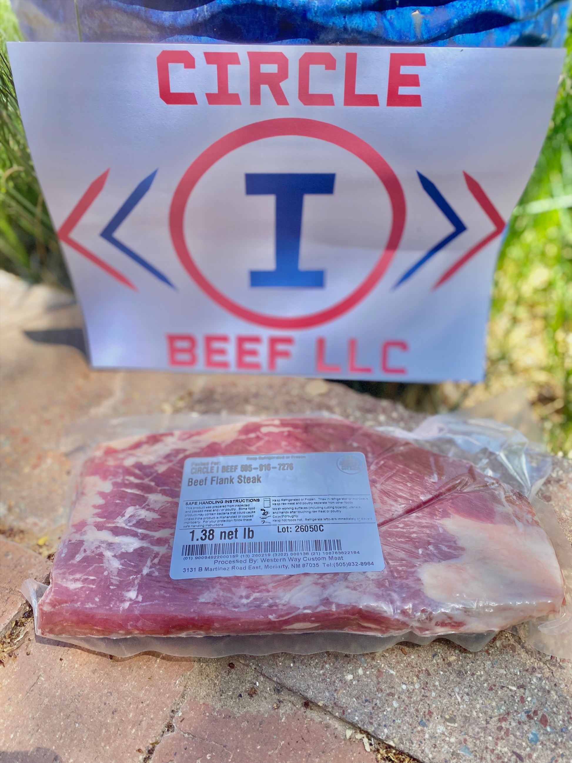 Packaged beef with a 'Circle I Beef LLC' sign in the background