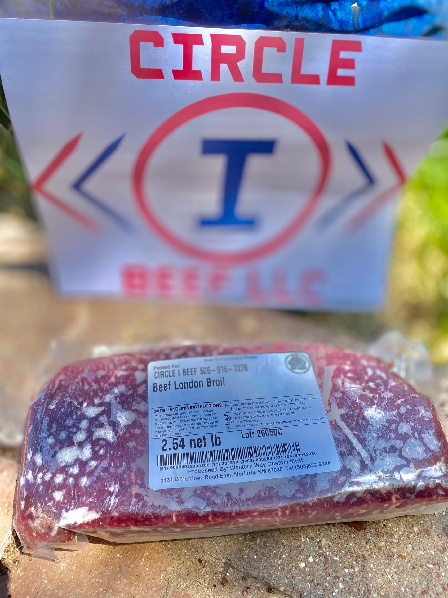 Packaged beef London broil with Circle I Beef LLC logo in the background