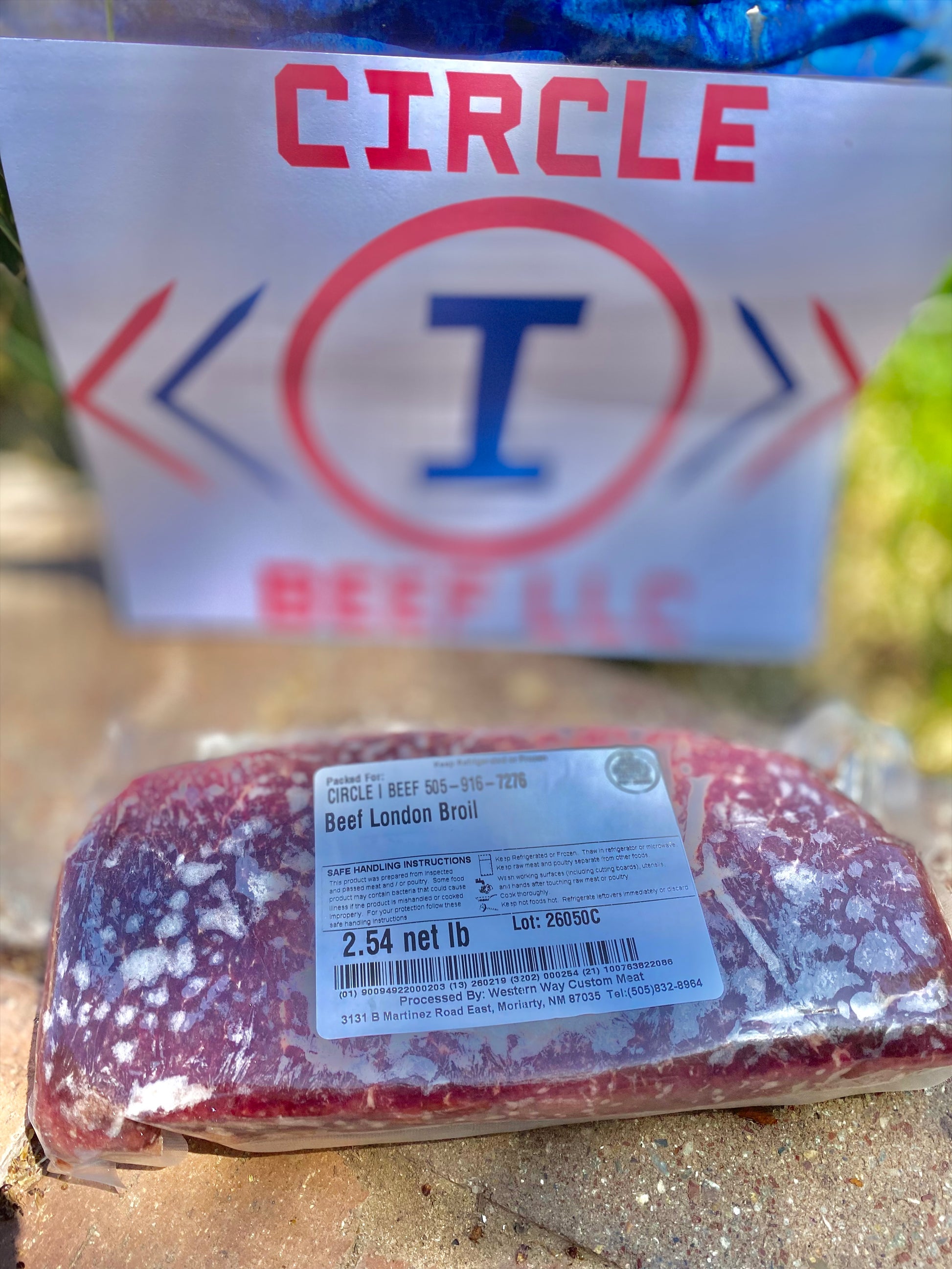 Packaged beef London broil with Circle I Beef LLC logo in the background