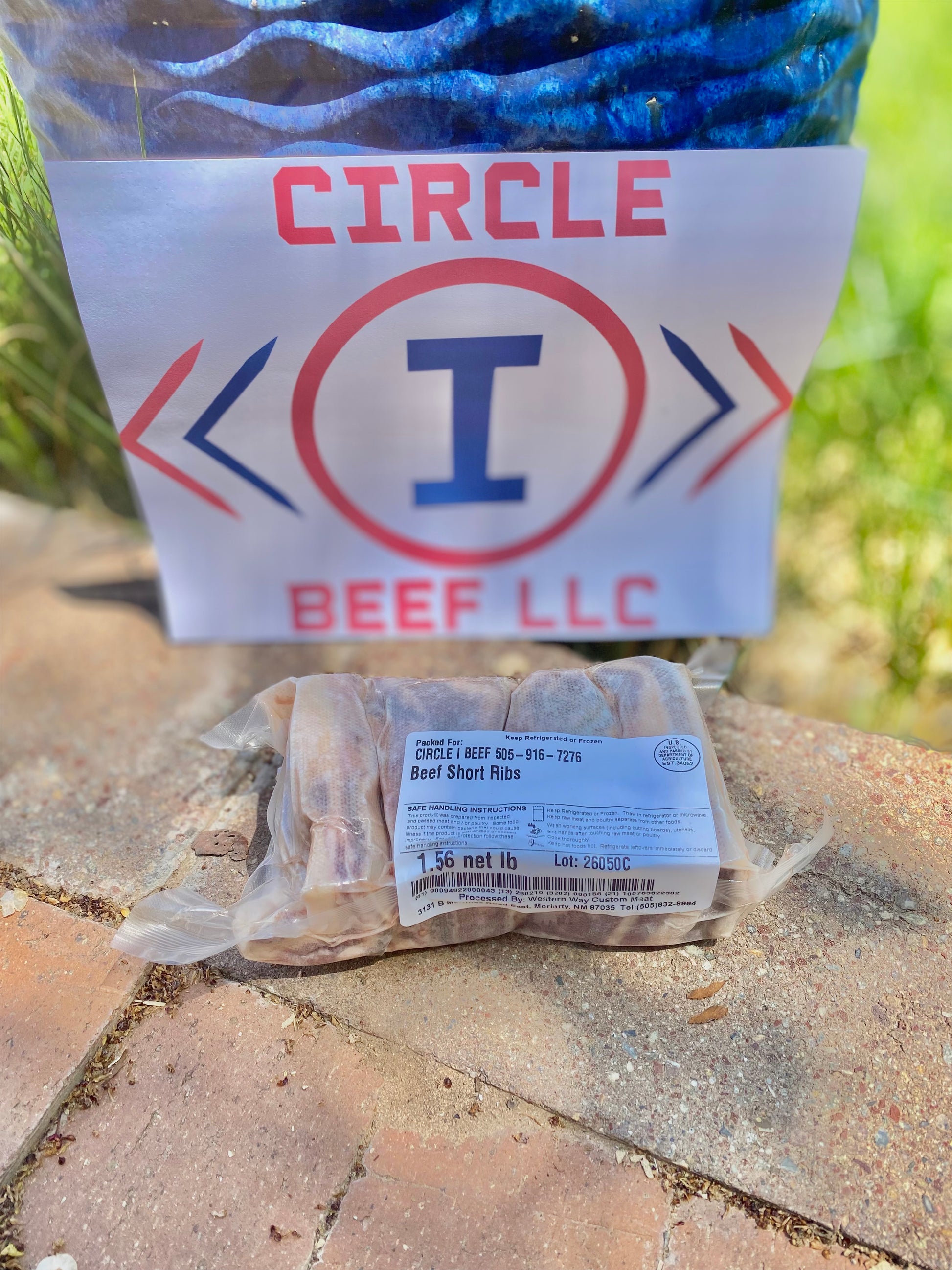 Packaged beef product with Circle I Beef LLC label on a stone surface